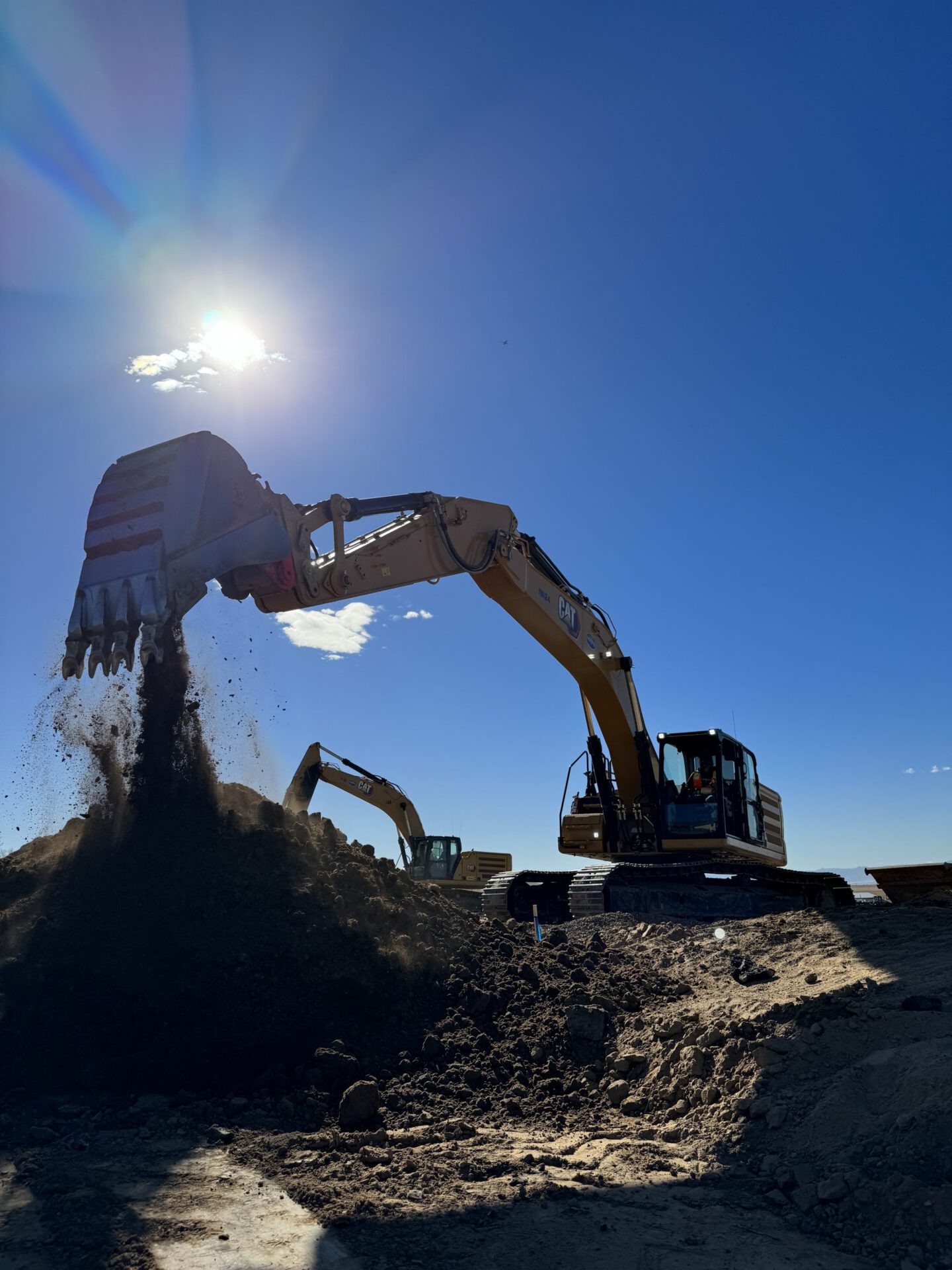 Two Excavators on the HEI Civil Eberly Job Site in 2023