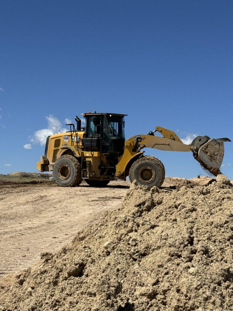 CAT loader moving dirt